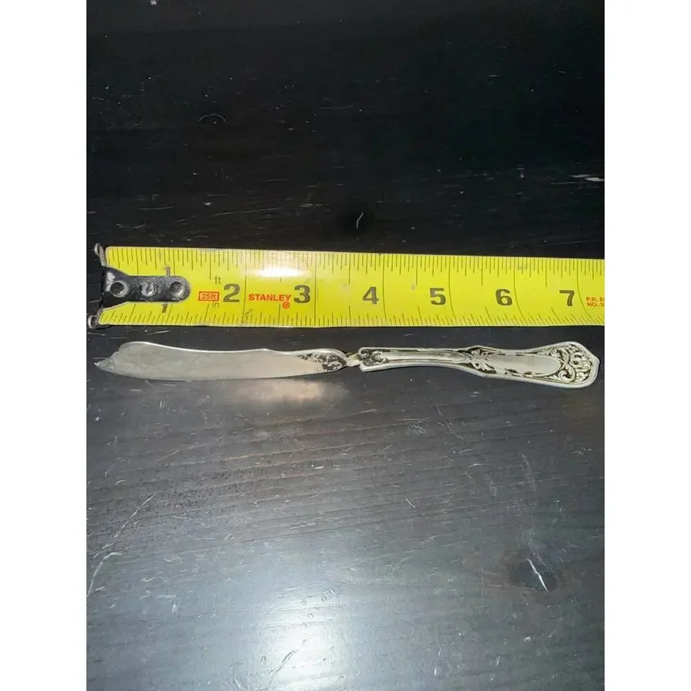 Antique Wm. Rogers Silverplate Twisted Butter Knife